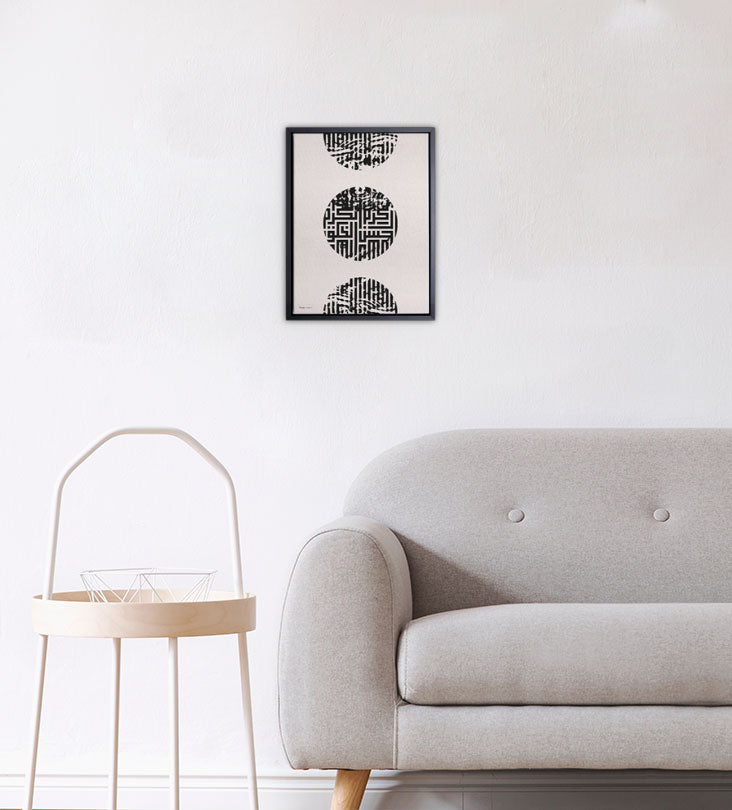 Three circles on top of each other in Arabic calligraphy printed on canvas