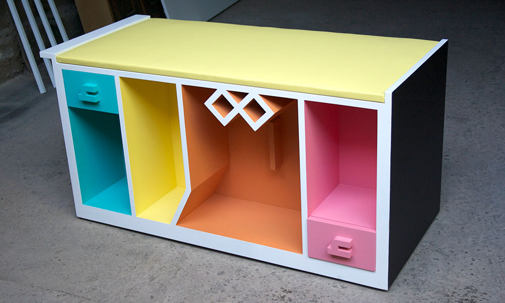 Mobile bookcase for children made from the word read iqra in Arabic calligraphy