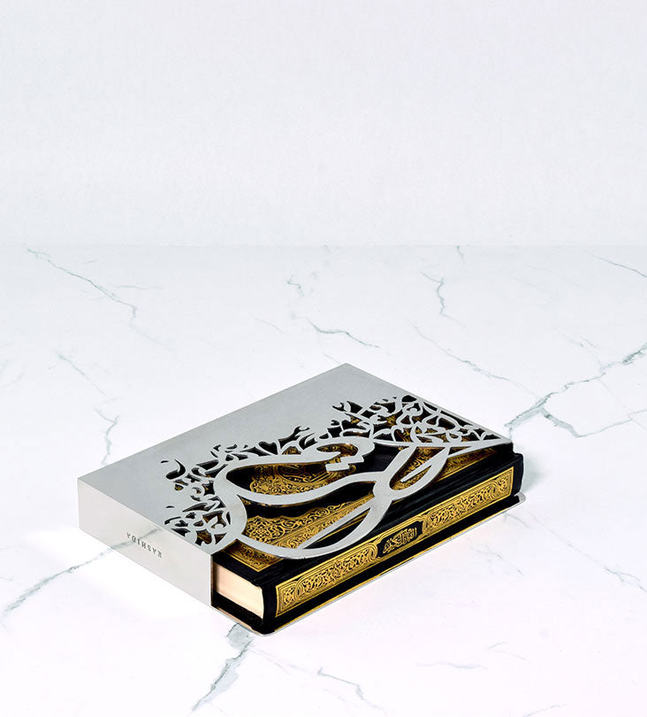Silver sleeve for quran in Arabic calligraphy