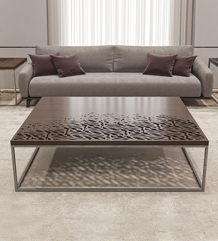 Luxury coffee table with Arabic calligraphy merging into wood with stainless steel base