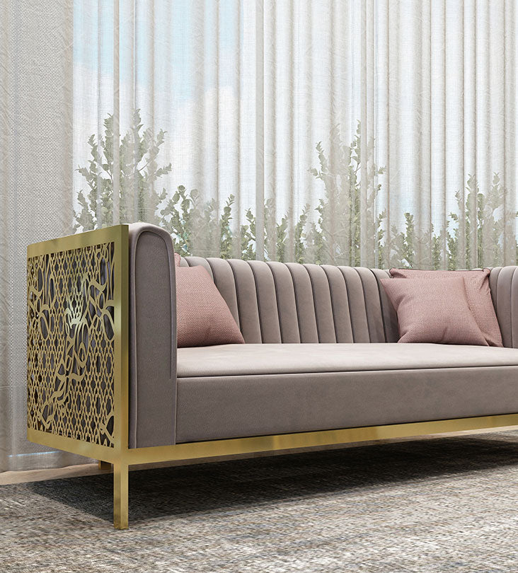 Polished gold steel luxury sofa with arabesque patterns and arabic letters