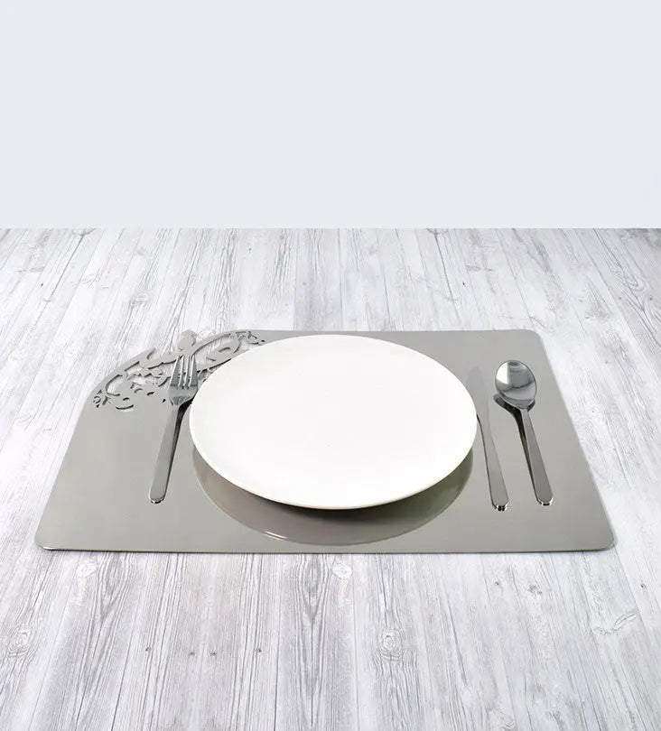 Silver stainless steel placemat in Arabic calligraphy