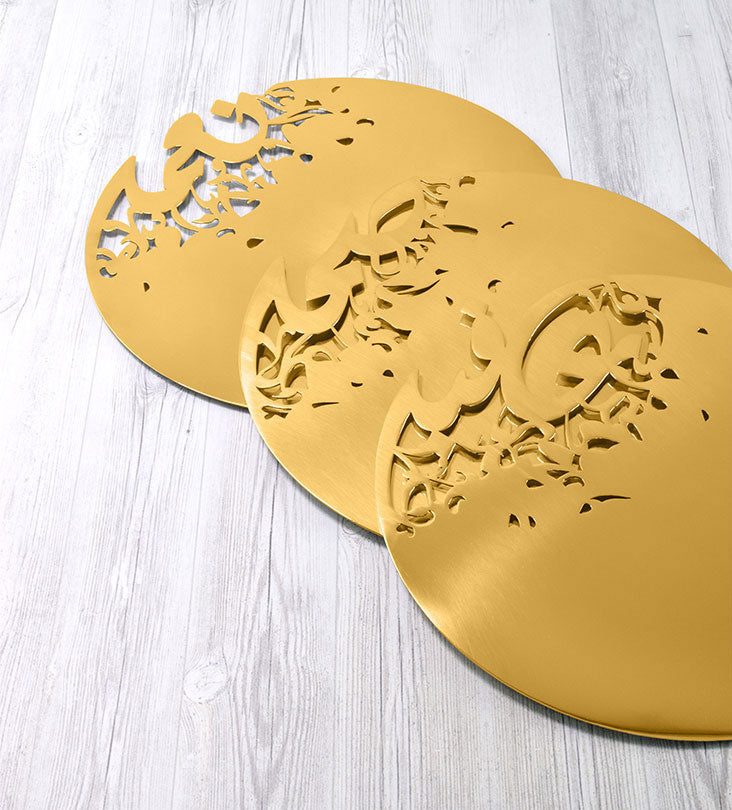 Gold stainless steel placemat in Arabic calligraphy