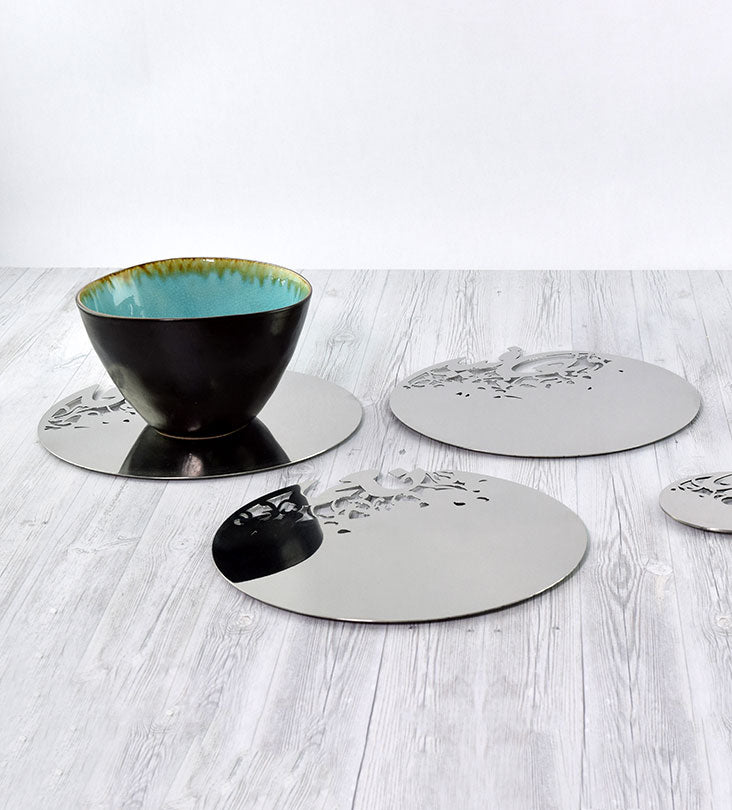 Silver stainless steel placemat in Arabic calligraphy