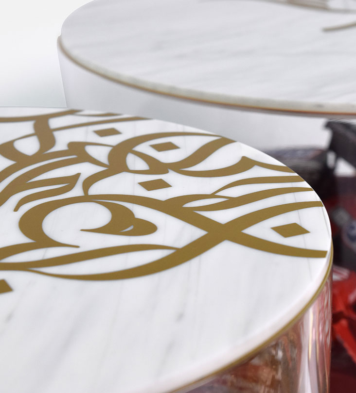 Medium marble acrylic storage can with Arabic graffiti print and gold base