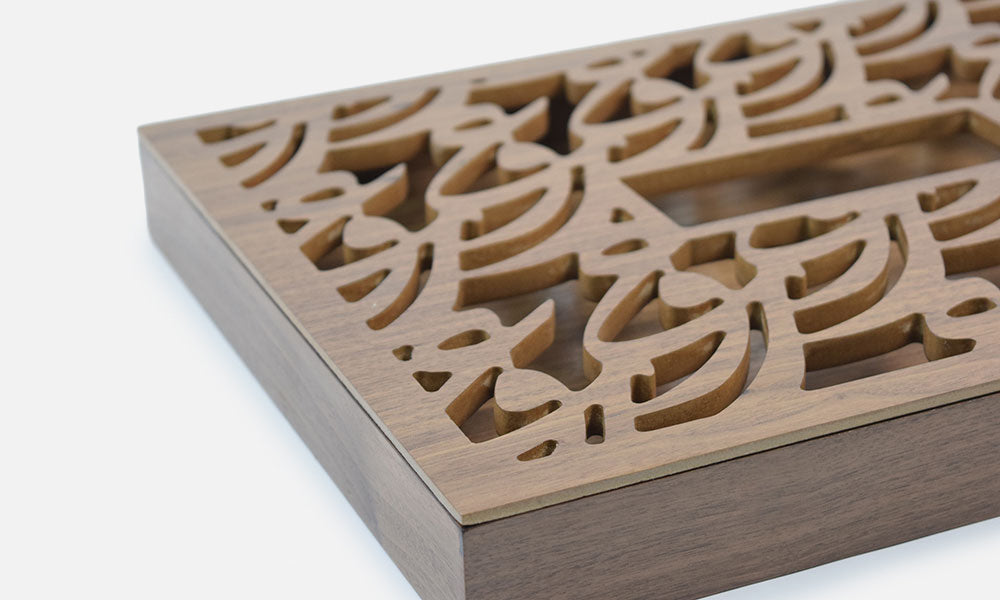 Commissioned wooden box for corporate brochure in Arabic calligraphy