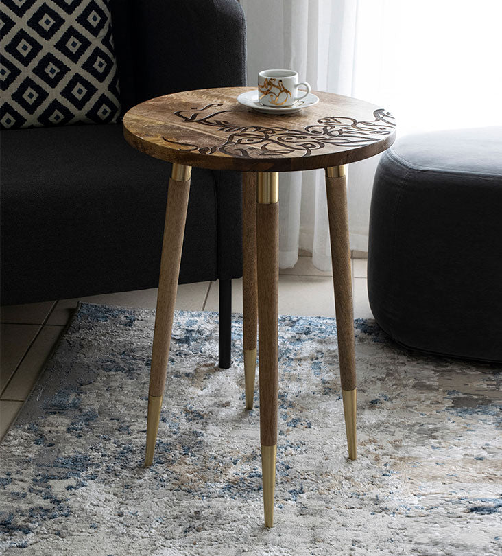 Wooden round table with contemporary Arabic graffiti etchings