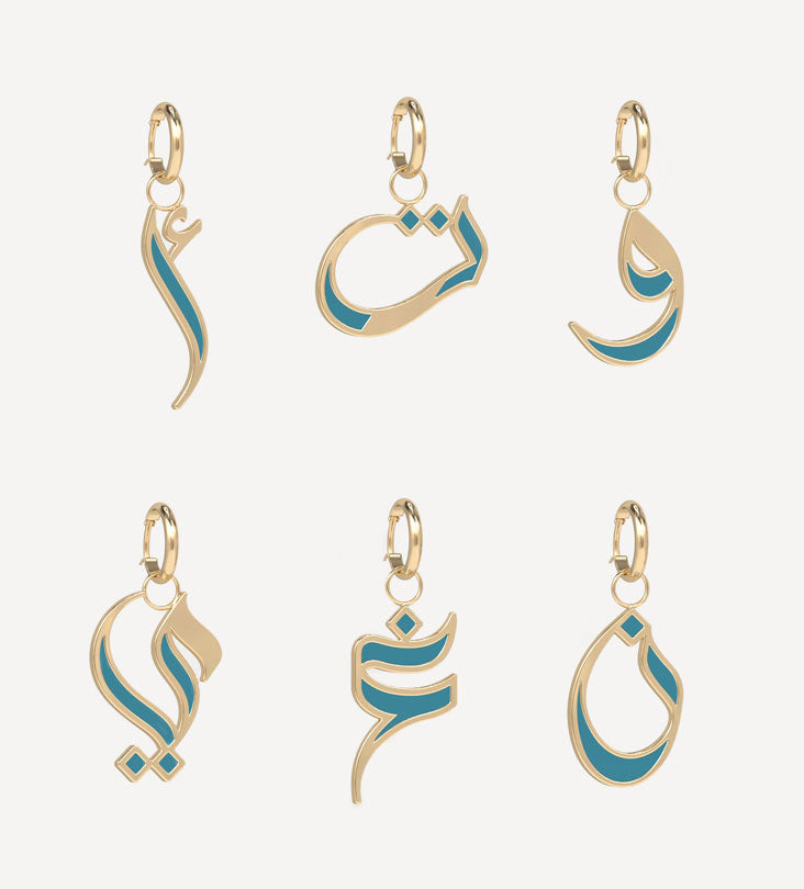 Custom made gold pendant earrings made with Arabic calligraphy letters 