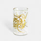Contemporary glass tea cups with Arabic graffiti print