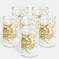 Contemporary glass tea cups with Arabic graffiti print