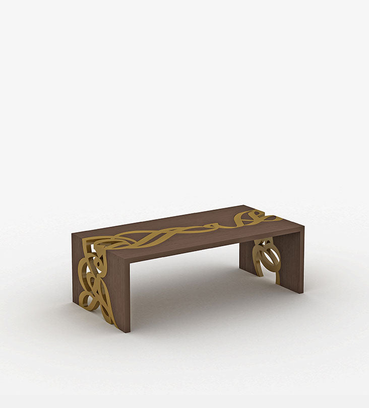 Luxurious gold and walnut wood coffee table with arabic letters woodwork on edges featuring modern arabic calligraphy from kashida design