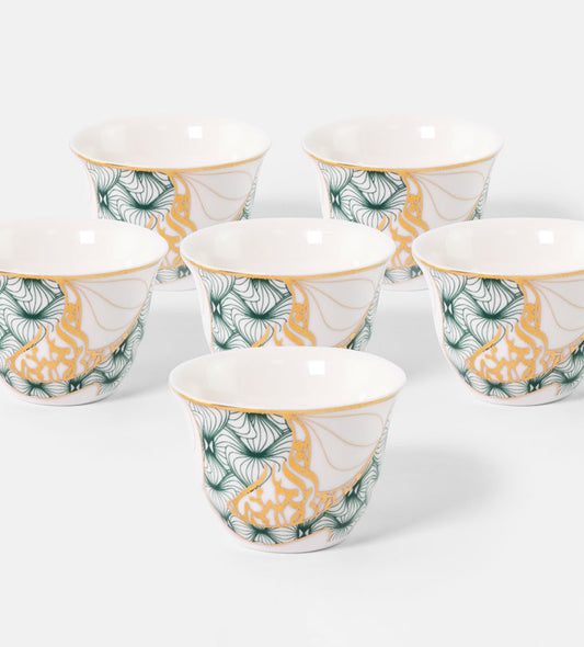 Porcelain Arabic coffee cup by Kashida in emerald green and gold hues