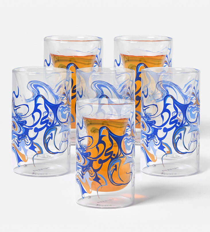 Contemporary glass tea cups with Arabic calligraphy fluid art