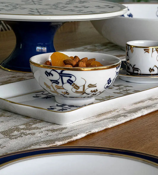 Small porcelain condiment bowls for nuts or puddings featuring Arabic calligraphy pattern in royal blue and gold