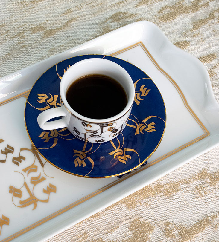 Elegant royal blue and gold espresso cup and saucer with Arabic calligraphy pattern print on porcelain