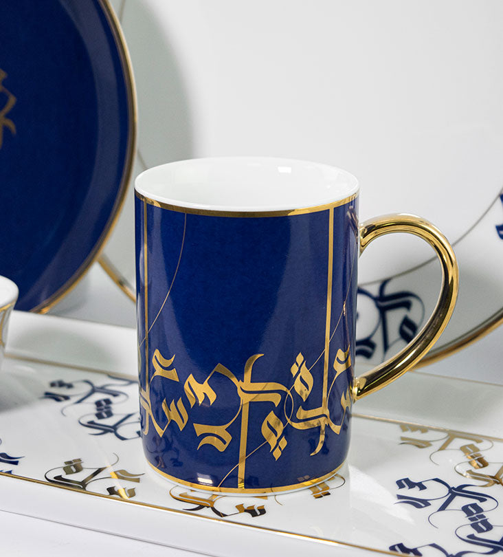 Royal blue and gold porcelain mug with Arabic calligraphy pattern