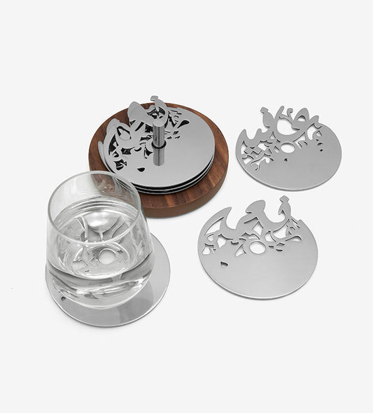 Round silver coasters with wooden base in Arabic calligraphy