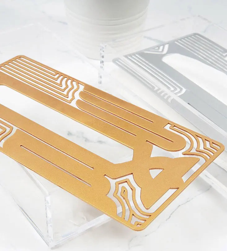Metal and acrylic tissue box in Arabic calligraphy line art gold